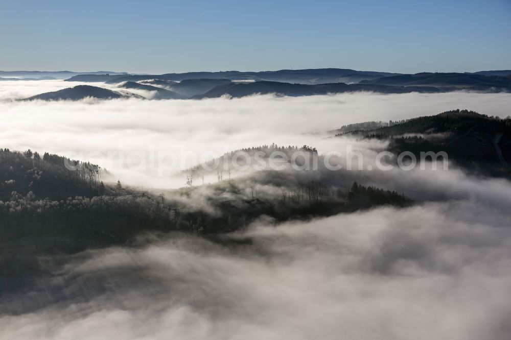 Aerial photograph Meschede - Autumn - Weather landscape over the space enclosed by clouds and haze valleys and wooded areas near Meschede in the state of North Rhine-Westphalia