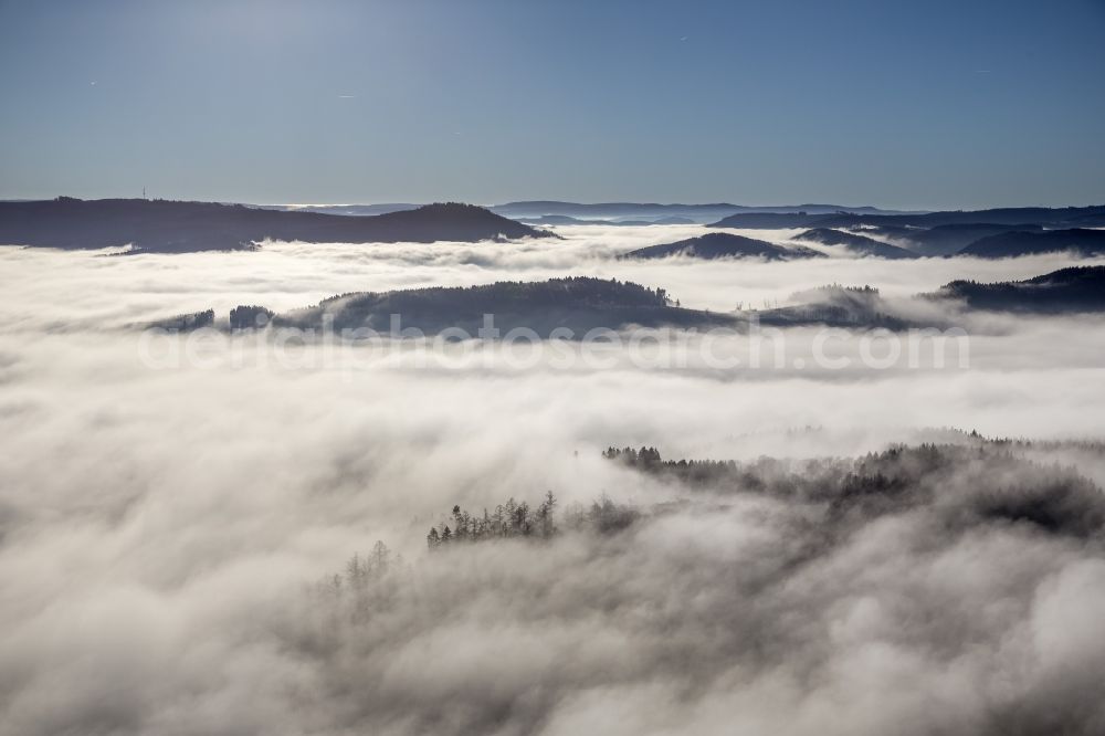 Aerial photograph Meschede - Autumn - Weather landscape over the space enclosed by clouds and haze valleys and wooded areas near Meschede in the state of North Rhine-Westphalia