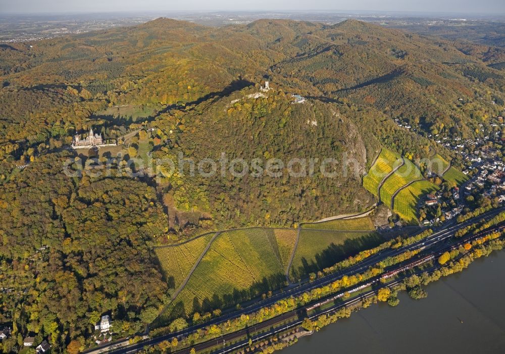 Aerial photograph Königswinter - Autumn view of Castle Dragon Castle upon Rhine in Königswinter in the federal state North Rhine-Westphalia. The opened to the public restored and renovated castle is monument protected and operated by the Schloss Drachenburg gGmbH.