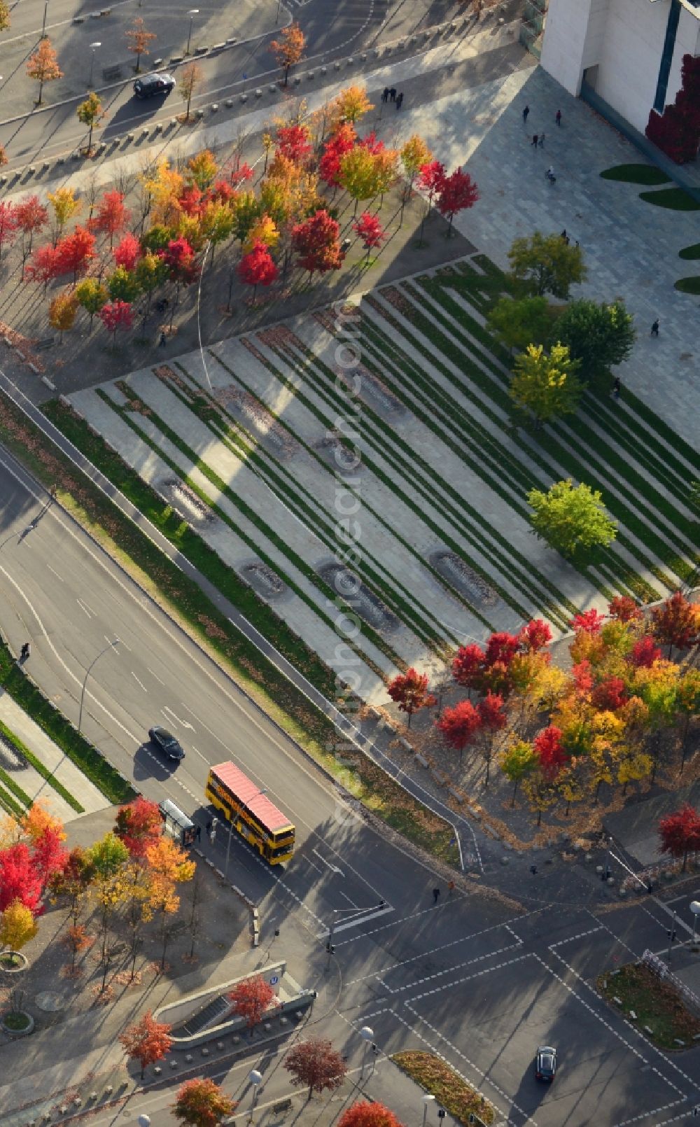 Aerial image Berlin Mitte - Autumn landscape colorful colored rows of trees on the forum at the chancellery in Berlin - Mitte