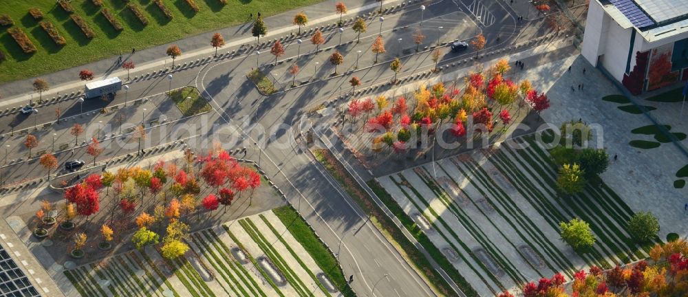 Aerial photograph Berlin Mitte - Autumn landscape colorful colored rows of trees on the forum at the chancellery in Berlin - Mitte