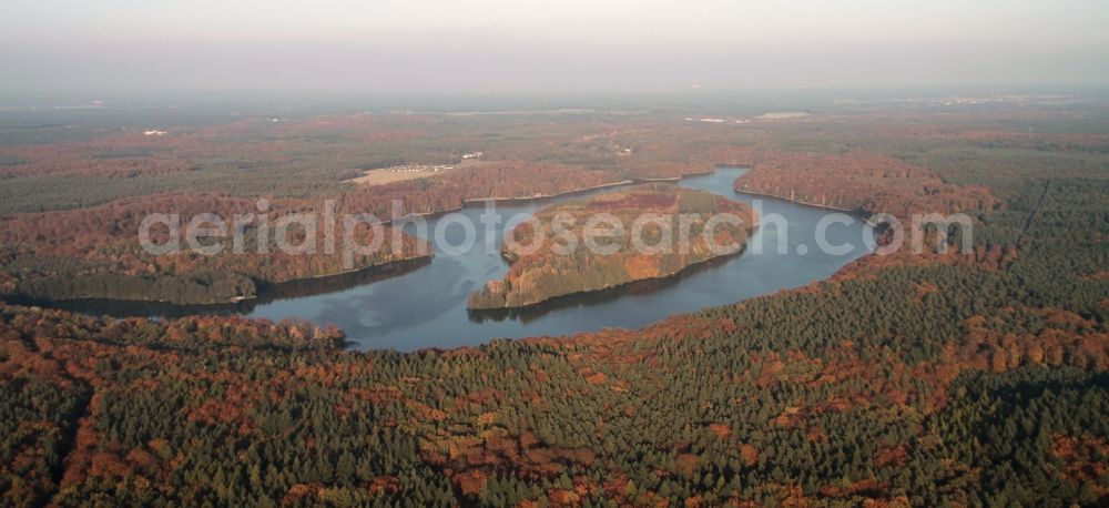 Lanke from the bird's eye view: Lake Island on the colorful in the autumn colored forests on Liepnitzsee in Lanke in the state Brandenburg