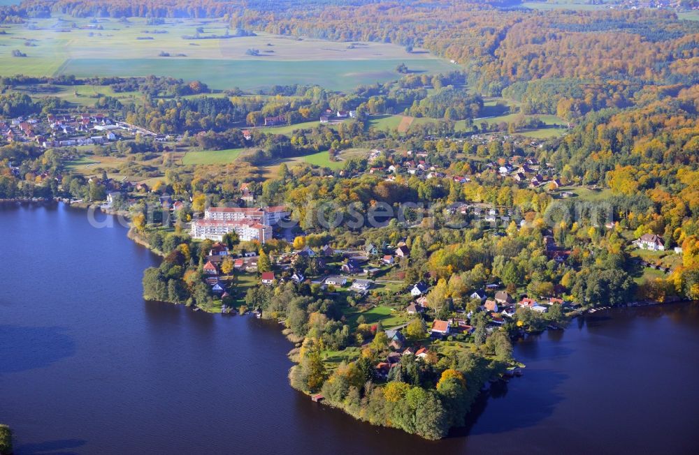 Feldberg from above - Autumnal view at the Feldberg lake landscape near the Feldberg in the federal state of Mecklenburg-Vorpommern. Here to see the Hausee and the city of Feldberg