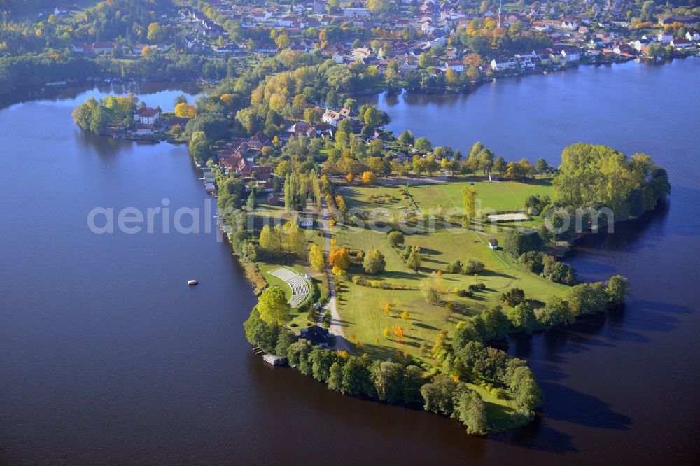 Feldberg from the bird's eye view: Autumnal view at the Feldberg lake landscape near the Feldberg in the federal state of Mecklenburg-Vorpommern. Here to see the Hausee and the city of Feldberg