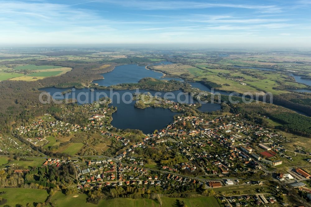 Feldberg from the bird's eye view: Autumnal view at the Feldberg lake landscape near the Feldberg in the federal state of Mecklenburg-Vorpommern. Here to see the Hausee and the city of Feldberg