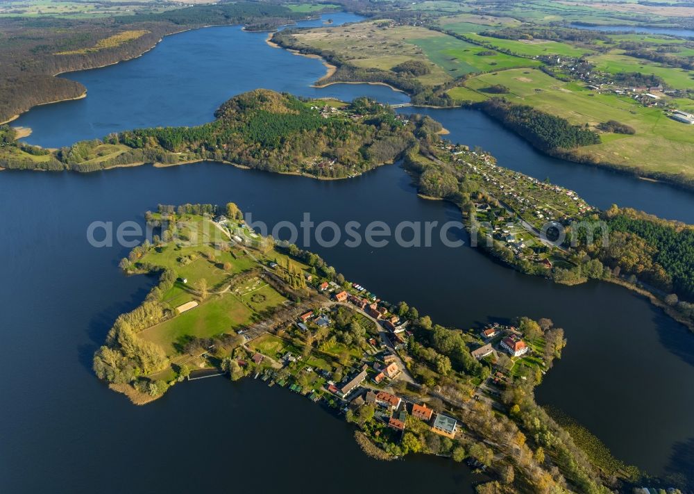 Aerial photograph Feldberg - Autumnal view at the Feldberg lake landscape near the Feldberg in the federal state of Mecklenburg-Vorpommern. Here to see the Hausee and the city of Feldberg