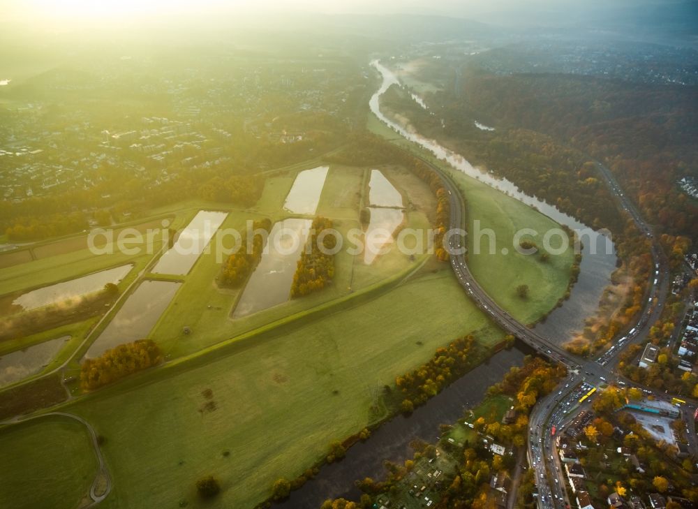 Aerial image Essen - Autumnal morning light over the waterworks of Essen-Ueberruhr in Essen in the state North Rhine-Westphalia. The facilities are located on the riverbank of the Ruhr