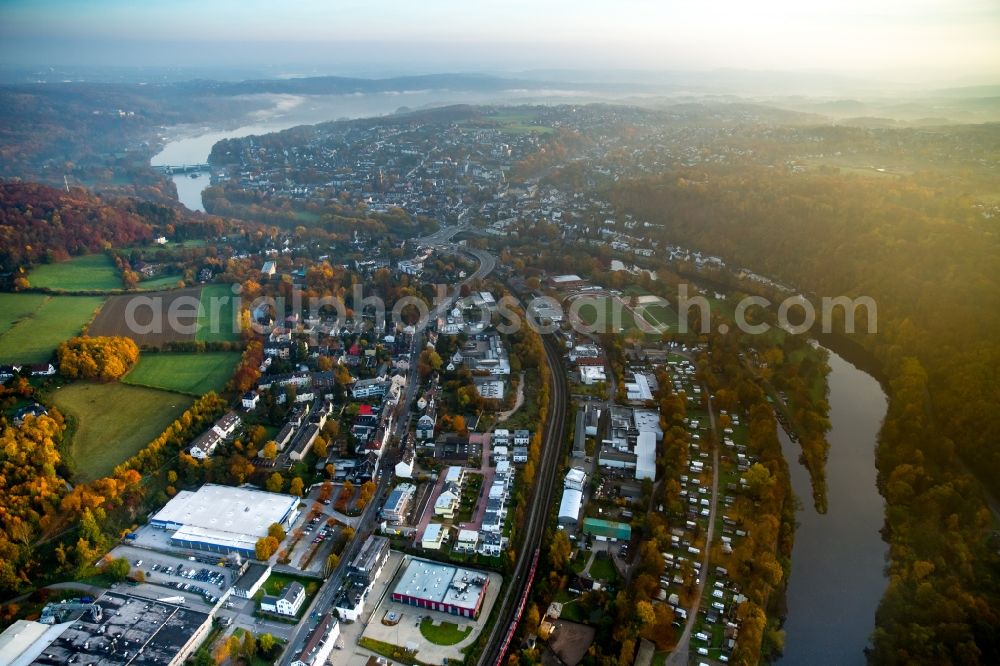 Essen from the bird's eye view: Autumnal view of the Werden part and its industrial area in Essen in the state of North Rhine-Westphalia