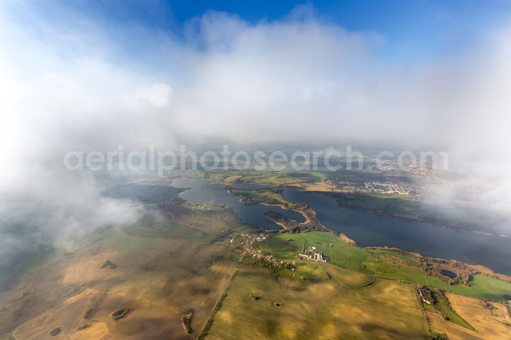 Aerial photograph Güstrow - Autumn clouds veiled Lakelands Güstrow in Mecklenburg - Western Pomerania