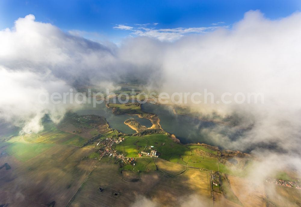 Güstrow from the bird's eye view: Autumn clouds veiled Lakelands Güstrow in Mecklenburg - Western Pomerania