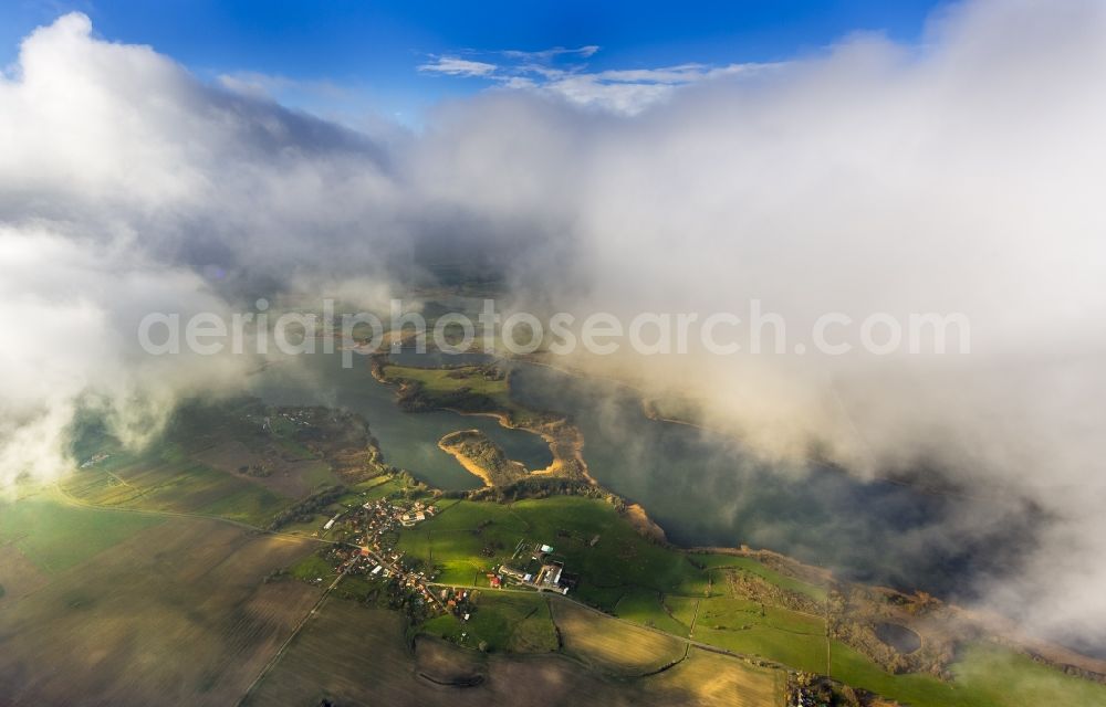 Aerial image Güstrow - Autumn clouds veiled Lakelands Güstrow in Mecklenburg - Western Pomerania