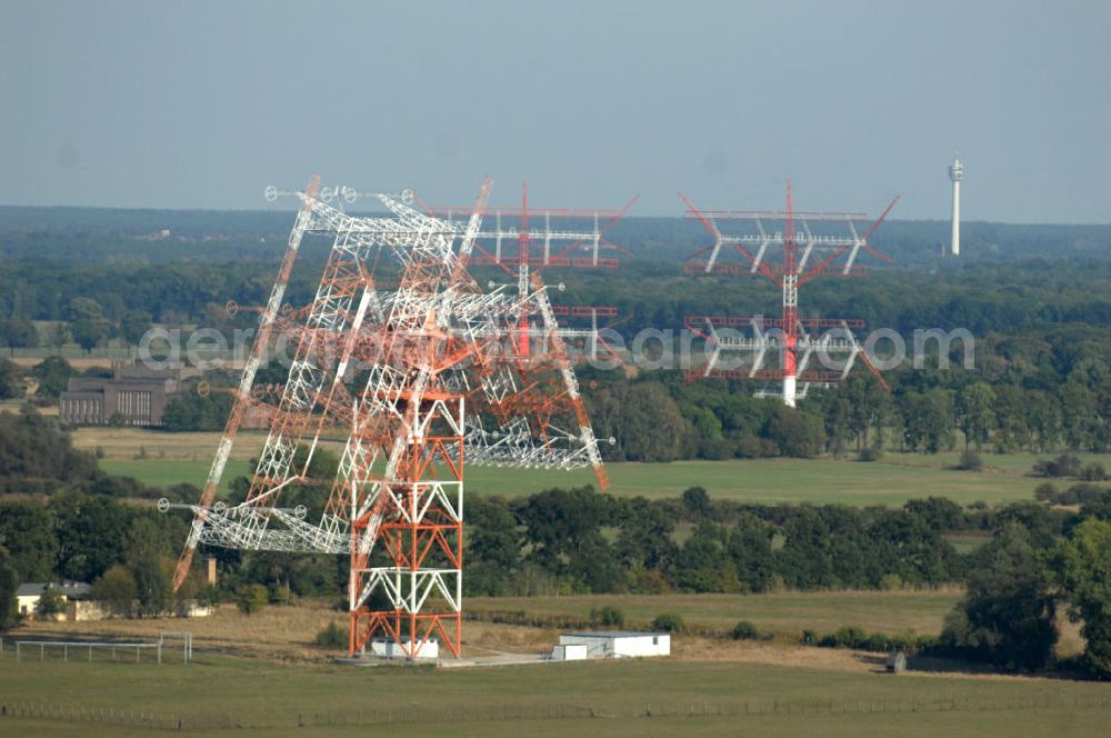 Aerial photograph NAUEN - Herbstlicher Blick auf das Areal der Kurzwellen- Rundfunksendestelle Nauen. Im Mittelpunkt Areales befindet sich das 1920 eingeweihte Muthesius-Gebäude, in dem heute die Leitstelle der vier modernen Kurzwellensender untergebracht ist. Von Nauen aus wird das Programm von DW-RADIO rund um den Globus gesendet.