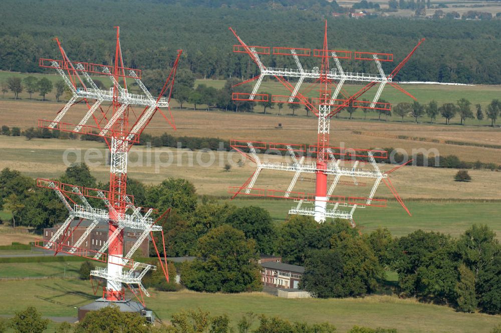 Aerial photograph NAUEN - Herbstlicher Blick auf das Areal der Kurzwellen- Rundfunksendestelle Nauen. Im Mittelpunkt Areales befindet sich das 1920 eingeweihte Muthesius-Gebäude, in dem heute die Leitstelle der vier modernen Kurzwellensender untergebracht ist. Von Nauen aus wird das Programm von DW-RADIO rund um den Globus gesendet.