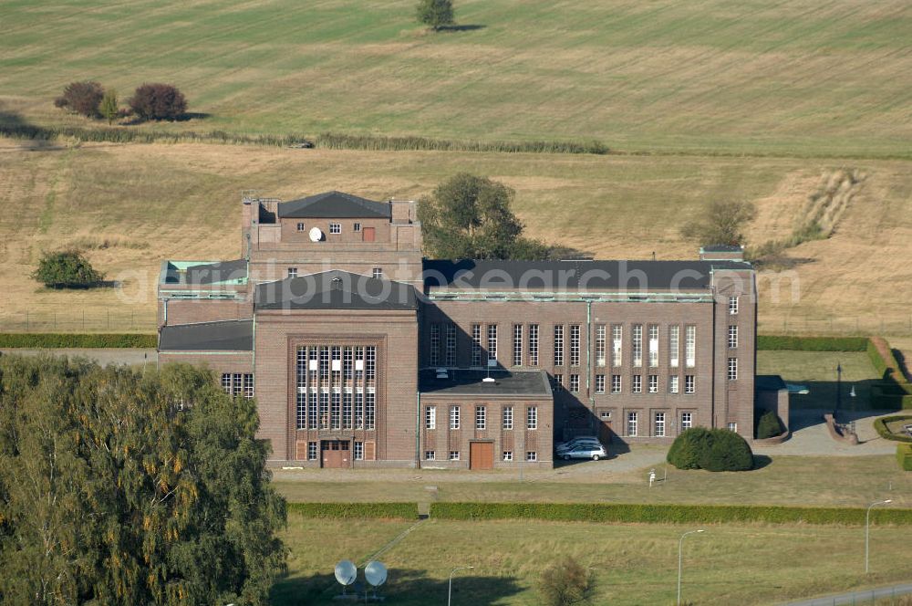 Aerial image NAUEN - Herbstlicher Blick auf das Areal der Kurzwellen- Rundfunksendestelle Nauen. Im Mittelpunkt Areales befindet sich das 1920 eingeweihte Muthesius-Gebäude, in dem heute die Leitstelle der vier modernen Kurzwellensender untergebracht ist. Von Nauen aus wird das Programm von DW-RADIO rund um den Globus gesendet.