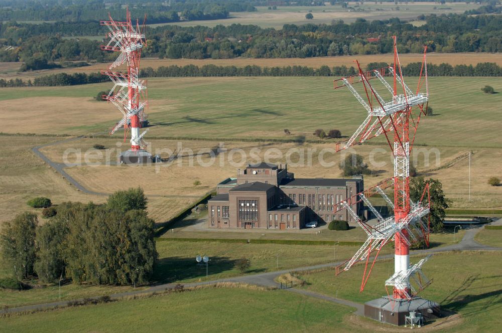 Aerial photograph NAUEN - Herbstlicher Blick auf das Areal der Kurzwellen- Rundfunksendestelle Nauen. Im Mittelpunkt Areales befindet sich das 1920 eingeweihte Muthesius-Gebäude, in dem heute die Leitstelle der vier modernen Kurzwellensender untergebracht ist. Von Nauen aus wird das Programm von DW-RADIO rund um den Globus gesendet.