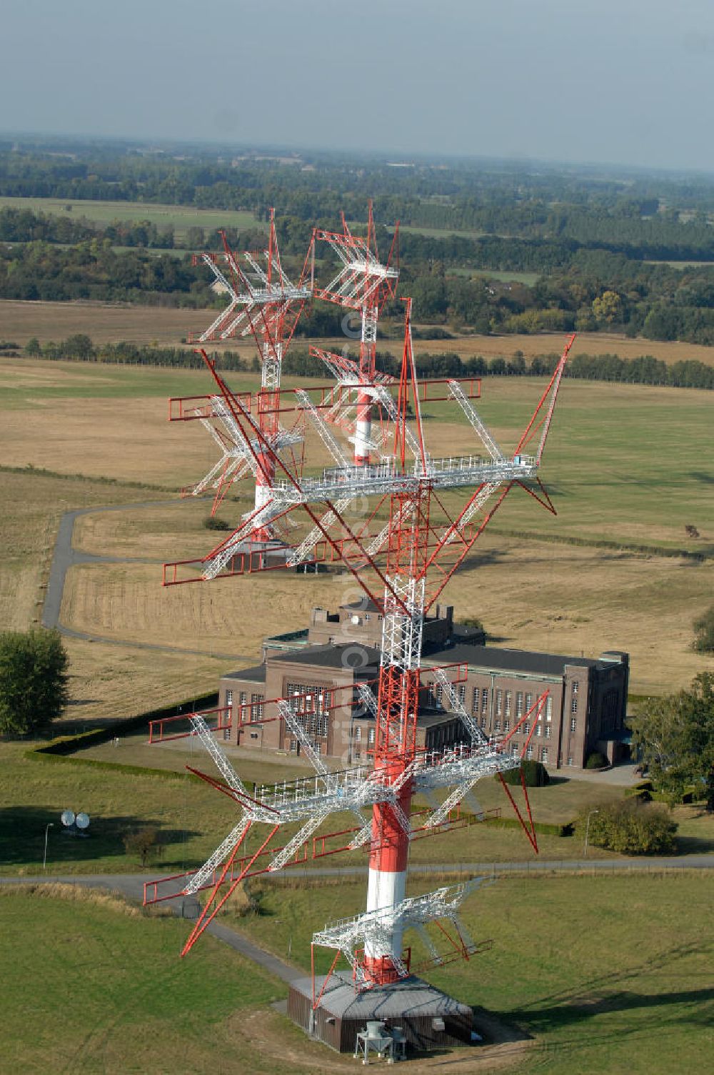 Aerial image NAUEN - Herbstlicher Blick auf das Areal der Kurzwellen- Rundfunksendestelle Nauen. Im Mittelpunkt Areales befindet sich das 1920 eingeweihte Muthesius-Gebäude, in dem heute die Leitstelle der vier modernen Kurzwellensender untergebracht ist. Von Nauen aus wird das Programm von DW-RADIO rund um den Globus gesendet.