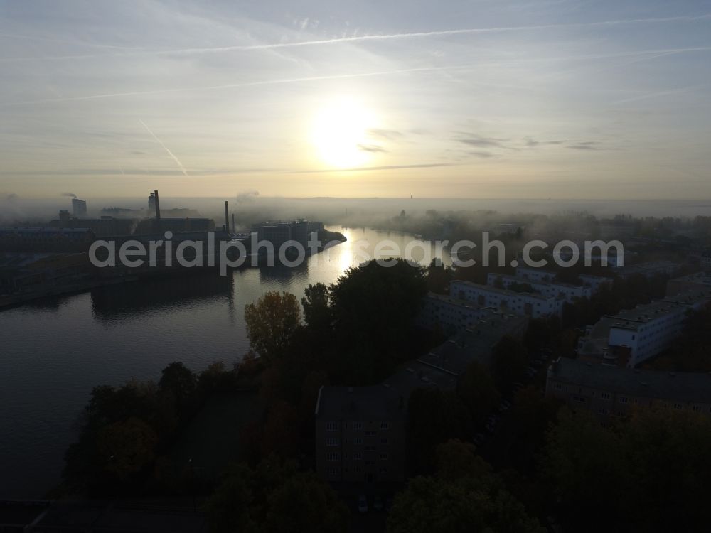 Berlin from the bird's eye view: Autumnal fog layers on the banks of the river course of the River Spree in Berlin Schoeneweide