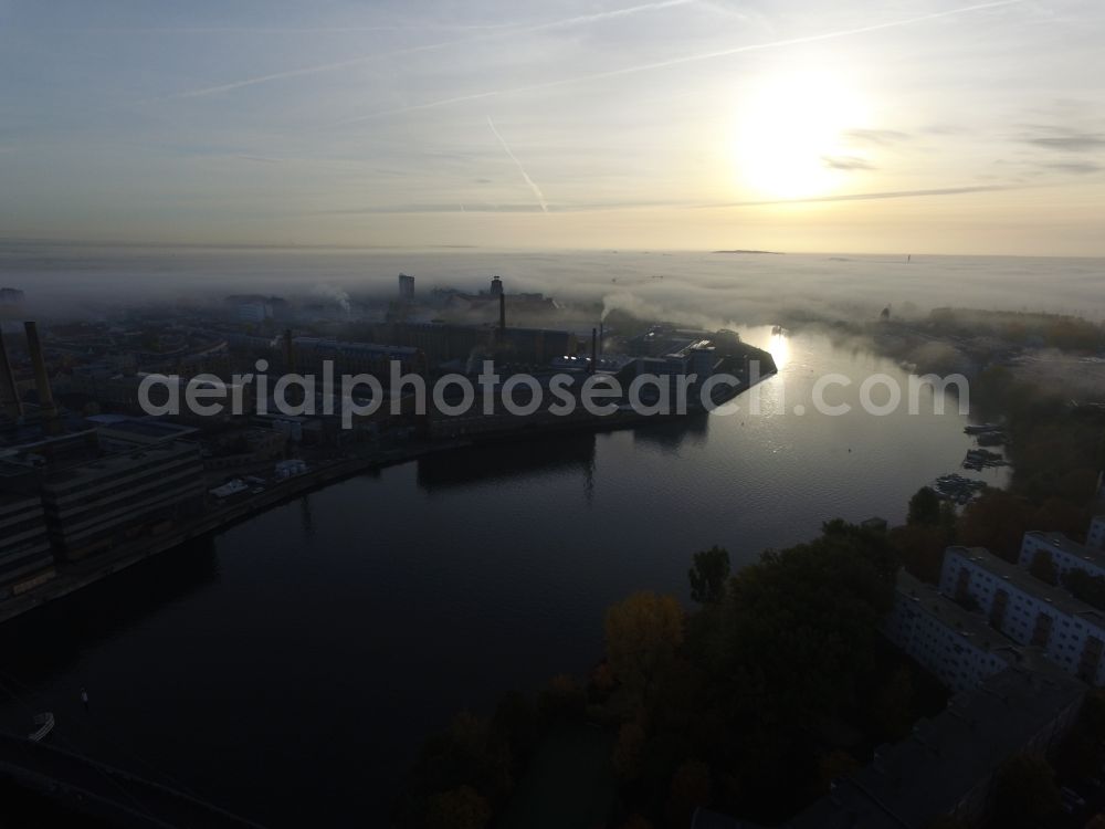 Aerial image Berlin - Autumnal fog layers on the banks of the river course of the River Spree in Berlin Schoeneweide