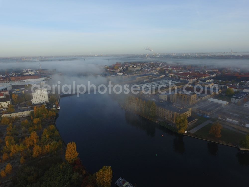 Berlin from the bird's eye view: Autumnal fog layers on the banks of the river course of the River Spree in Berlin Schoeneweide