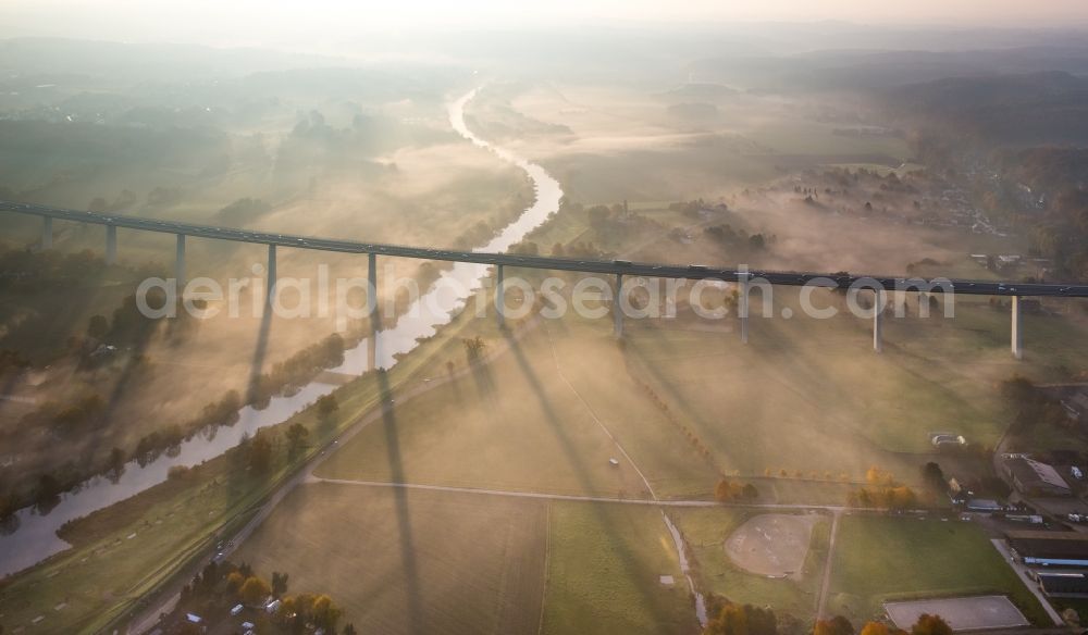 Mülheim an der Ruhr from the bird's eye view: Autumn fog and haze on the route and the lanes of the highway bridge over the motorway A 52 Ruhrtalbruecke in Muelheim an der Ruhr in the state North Rhine-Westphalia