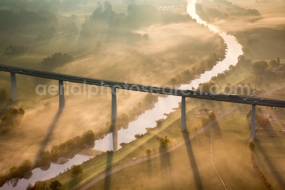 Aerial photograph Mülheim an der Ruhr - Autumn fog and haze on the route and the lanes of the highway bridge over the motorway A 52 Ruhrtalbruecke in Muelheim an der Ruhr in the state North Rhine-Westphalia