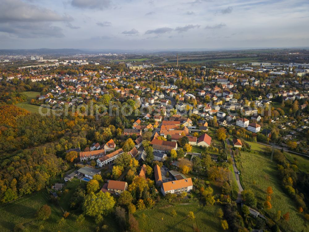 Aerial image Dresden - Autumnal colored vegetation view of the village center of Altcoschuetz in Dresden in the state of Saxony, Germany