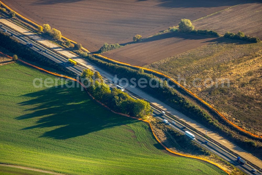 Aerial photograph Eboldshausen - Autumnal discolored vegetation view Highway route BAB A7 in in Eboldshausen in the state Lower Saxony, Germany