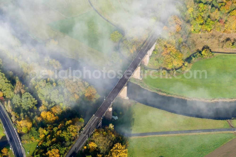 Aerial photograph Witzenhausen - Autumnal discolored vegetation view railway bridge building to route the train tracks in Witzenhausen in the state Hesse, Germany