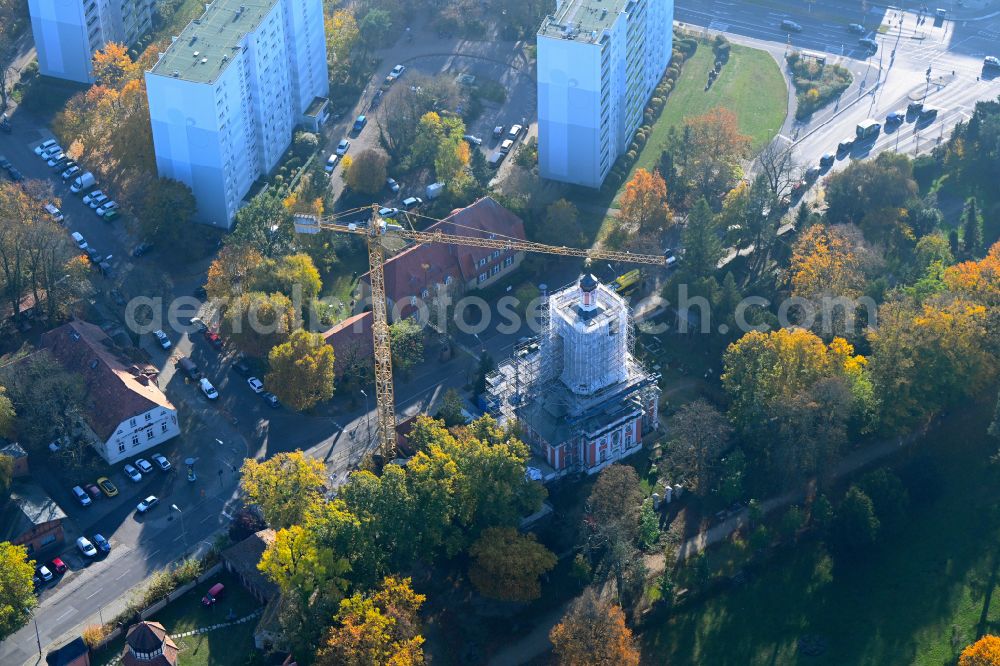 Aerial image Berlin - Autumnal discolored vegetation view construction site for renovation and reconstruction work on the church building of Schlosskirche on street Alt-Buch in the district Buch in Berlin, Germany