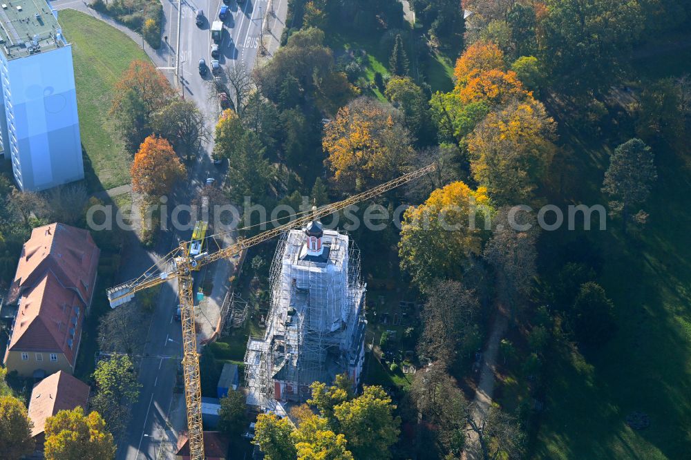 Aerial photograph Berlin - Autumnal discolored vegetation view construction site for renovation and reconstruction work on the church building of Schlosskirche on street Alt-Buch in the district Buch in Berlin, Germany