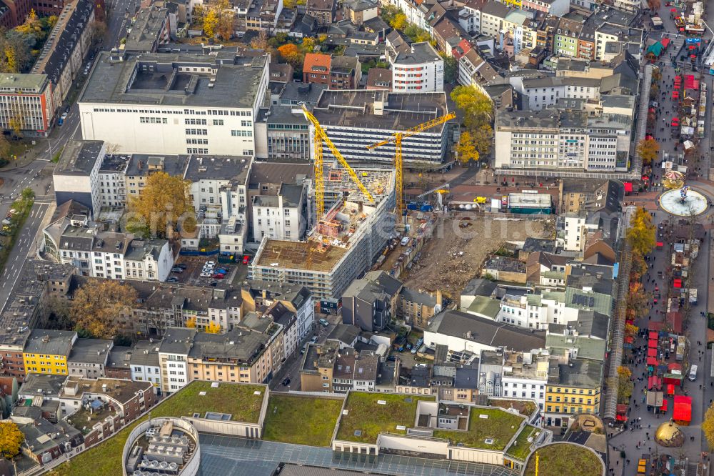 Duisburg from the bird's eye view: Autumnal discolored vegetation view construction site for the new building of an Office building - Ensemble on the Boersenstrasse on street Boersenstrasse in the district Dellviertel in Duisburg at Ruhrgebiet in the state North Rhine-Westphalia, Germany