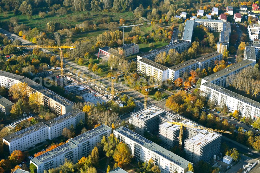 Berlin from the bird's eye view: Autumnal discolored vegetation view construction site for the new build retirement home Seniorenwohnen Cecilienstrasse on street Teterower Ring - Cecilienstrasse in the district Hellersdorf in Berlin, Germany