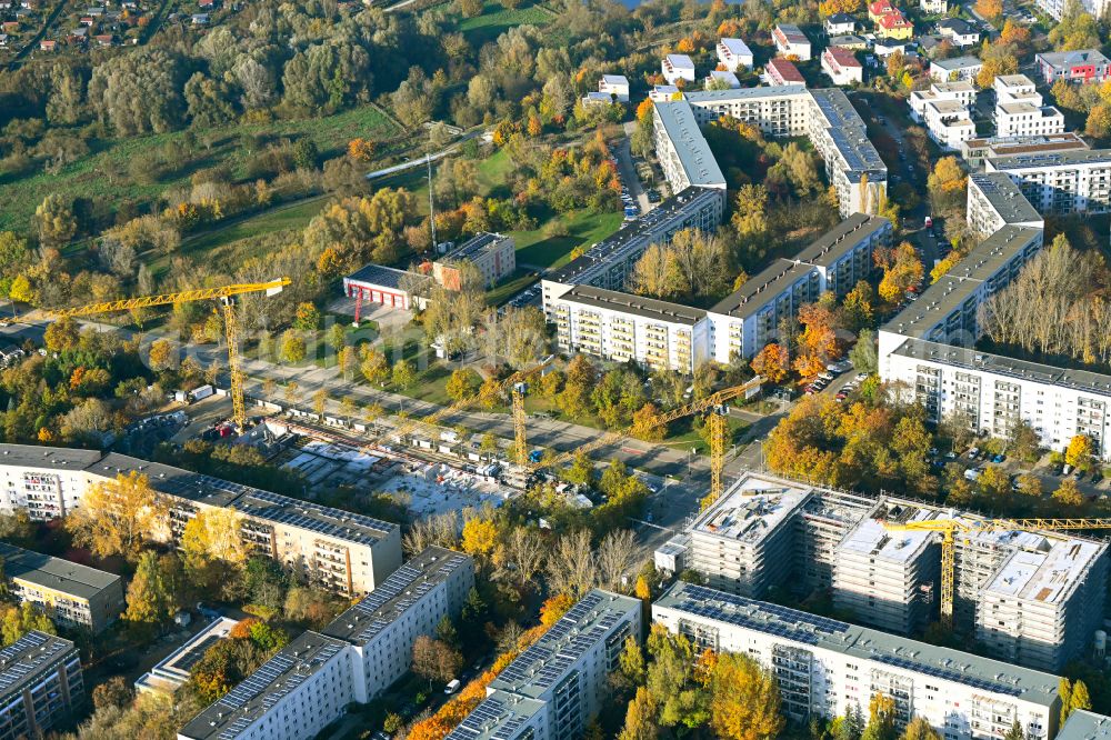 Aerial image Berlin - Autumnal discolored vegetation view construction site for the new build retirement home Seniorenwohnen Cecilienstrasse on street Teterower Ring - Cecilienstrasse in the district Hellersdorf in Berlin, Germany