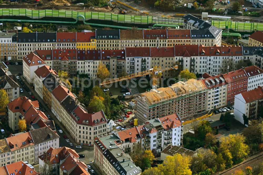 Leipzig from above - Autumnal discolored vegetation view construction site for the multi-family residential building on Wichernstrasse in the district Anger-Crottendorf in Leipzig in the state Saxony, Germany