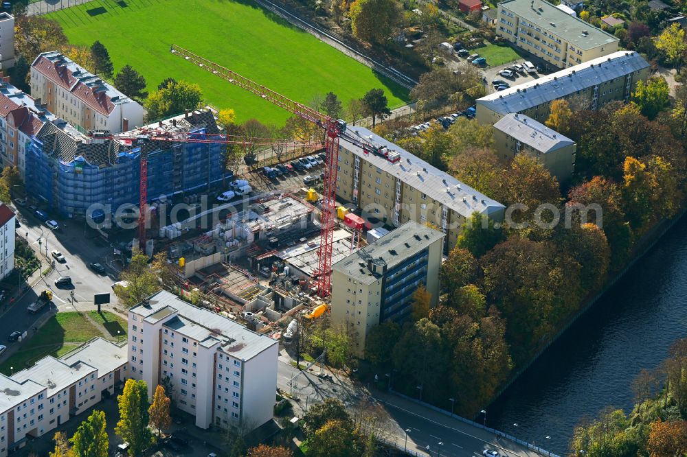 Aerial image Berlin - Autumnal discolored vegetation view construction site for the multi-family residential building on Ullsteinstrasse - Rathausstrasse in the district Mariendorf in Berlin, Germany