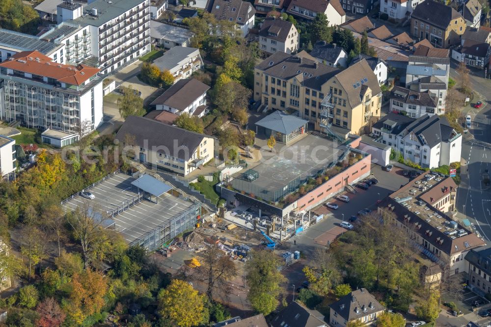 Herdecke from the bird's eye view: Autumn discolored vegetation view Construction site for the conversion of a branch of the Aldi supermarket on Stiftstrasse in Herdecke in the Ruhr area in the state of North Rhine-Westphalia, Germany