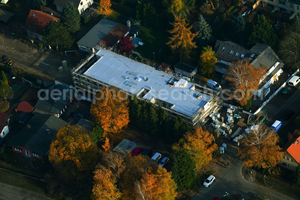 Berlin from above - Autumnal discolored vegetation view of new construction site for the construction of a kindergarten building and Nursery school on Dirschauer Strasse in the district Mahlsdorf in Berlin, Germany