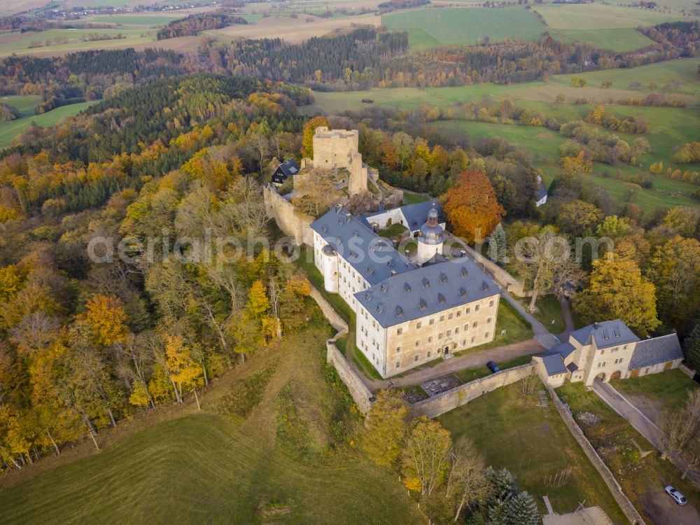 Frauenstein from above - Autumnal discolored vegetation view castle of the fortress Frauenstein in Frauenstein in the state Saxony, Germany