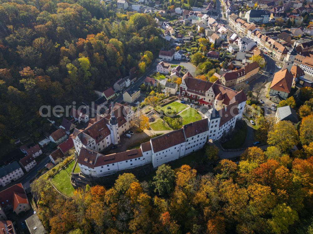 Nossen from the bird's eye view: Autumnal discolored vegetation view castle of Schloss Nossen in Nossen in the state Saxony, Germany