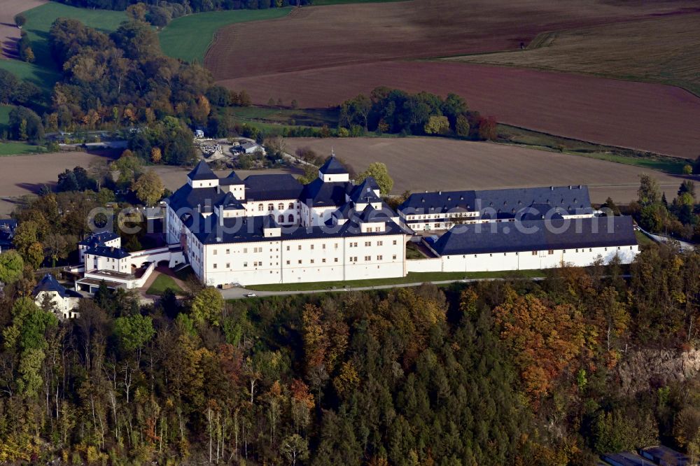 Augustusburg from above - Autumnal discolored vegetation view castle of Schloss and theater in Augustusburg in the state Saxony