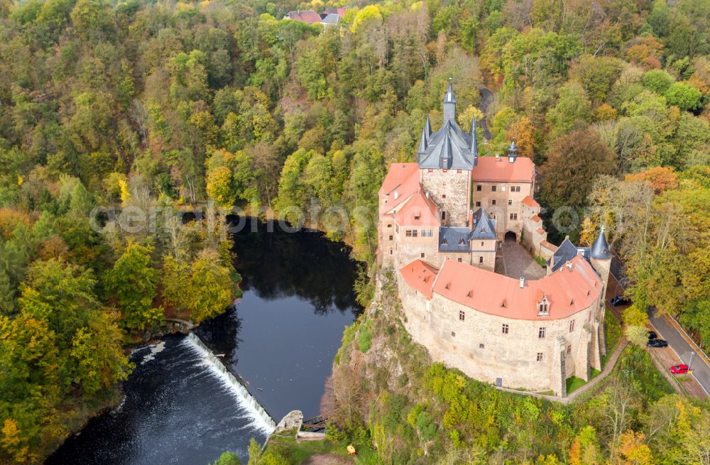 Kriebstein from above - Autumnal discolored vegetation view walls of the castle complex on the plateau on street Kriebsteiner Strasse in Kriebstein in the state Saxony, Germany