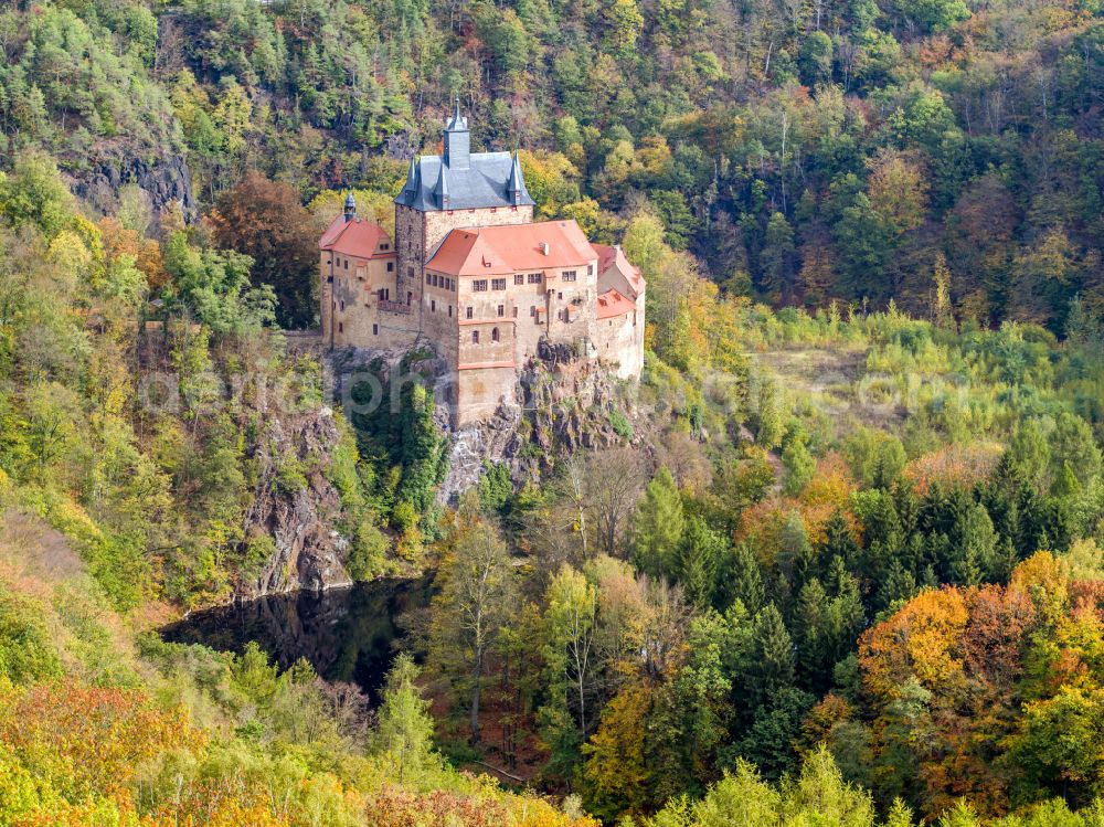 Kriebstein from above - Autumnal discolored vegetation view walls of the castle complex on the plateau on street Kriebsteiner Strasse in Kriebstein in the state Saxony, Germany