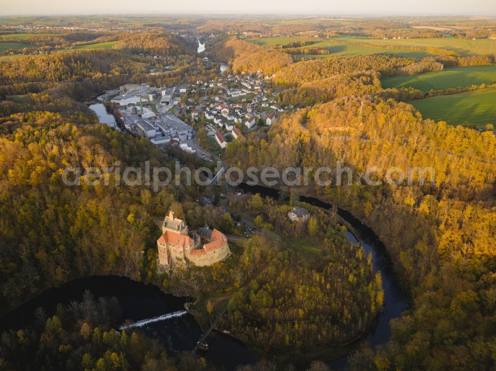 Kriebstein from above - Autumnal discolored vegetation view walls of the castle complex on the plateau on street Kriebsteiner Strasse in Kriebstein in the state Saxony, Germany