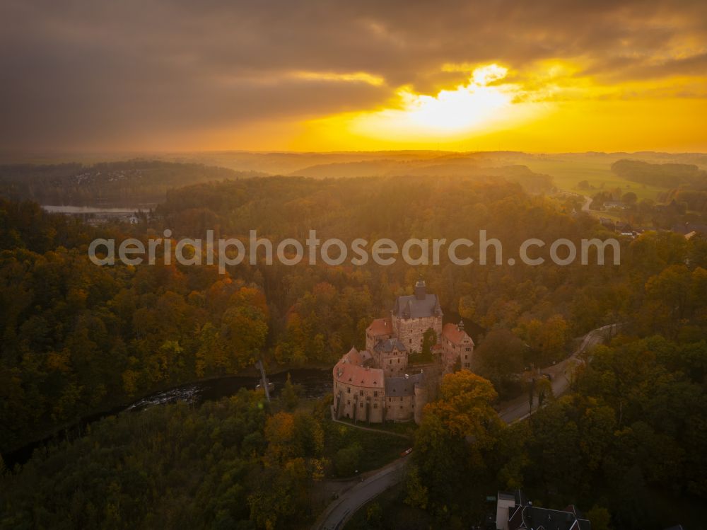 Kriebstein from above - Autumnal discolored vegetation view walls of the castle complex on the plateau on street Kriebsteiner Strasse in Kriebstein in the state Saxony, Germany