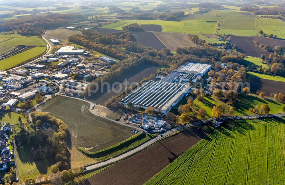 Aerial image Menden (Sauerland) - Autumnal discolored vegetation view company grounds and facilities of BEGA Gantenbrink-Leuchten KG in Menden (Sauerland) at Sauerland in the state North Rhine-Westphalia, Germany