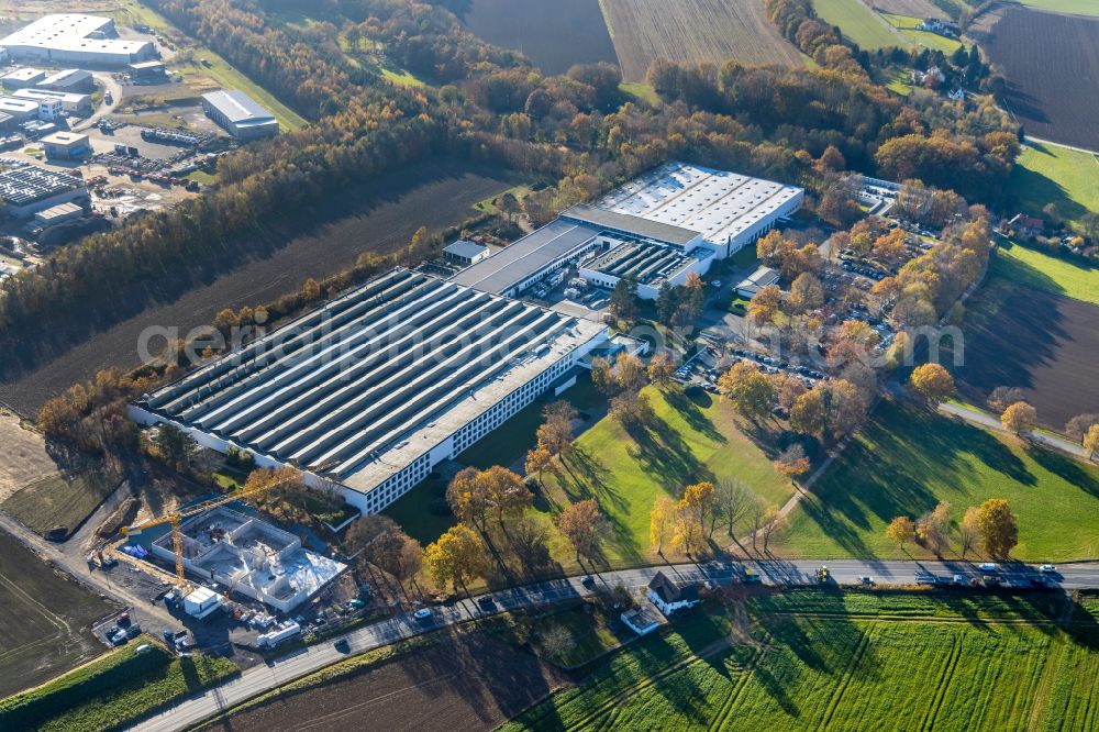 Menden (Sauerland) from above - Autumnal discolored vegetation view company grounds and facilities of BEGA Gantenbrink-Leuchten KG in Menden (Sauerland) at Sauerland in the state North Rhine-Westphalia, Germany