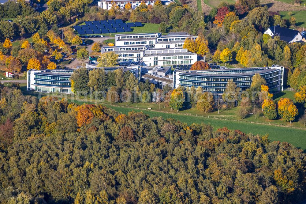 Gladbeck from the bird's eye view: Autumnal discolored vegetation view company grounds and facilities of IWG Innovationszentrum Wiesenbusch on street Am Wiesenbusch in Gladbeck at Ruhrgebiet in the state North Rhine-Westphalia, Germany