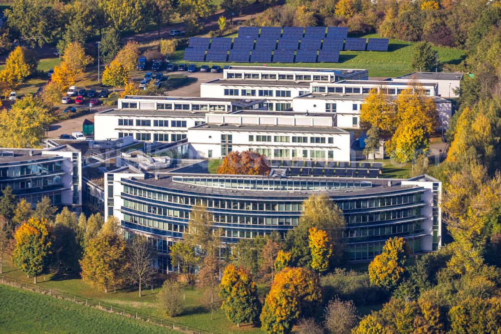 Aerial photograph Gladbeck - Autumnal discolored vegetation view company grounds and facilities of IWG Innovationszentrum Wiesenbusch on street Am Wiesenbusch in Gladbeck at Ruhrgebiet in the state North Rhine-Westphalia, Germany