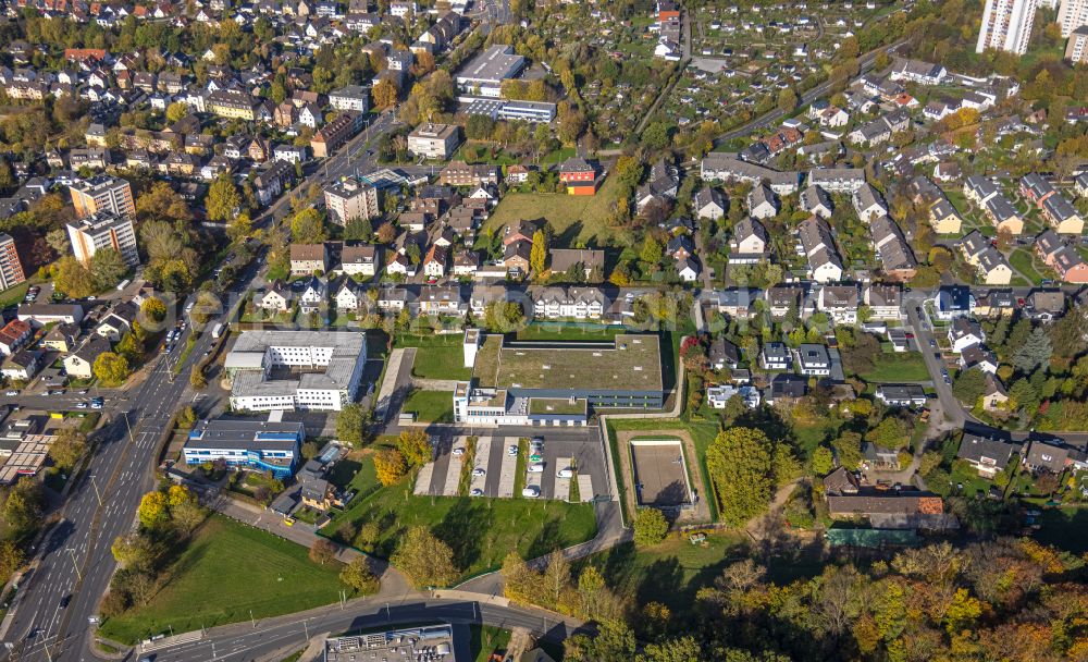 Aerial image Hagen - Autumnal discolored vegetation view company grounds and facilities of Sanitaetshaus Riepe GmbH & Co. KG on Knippschildstrasse in Hagen at Ruhrgebiet in the state North Rhine-Westphalia, Germany