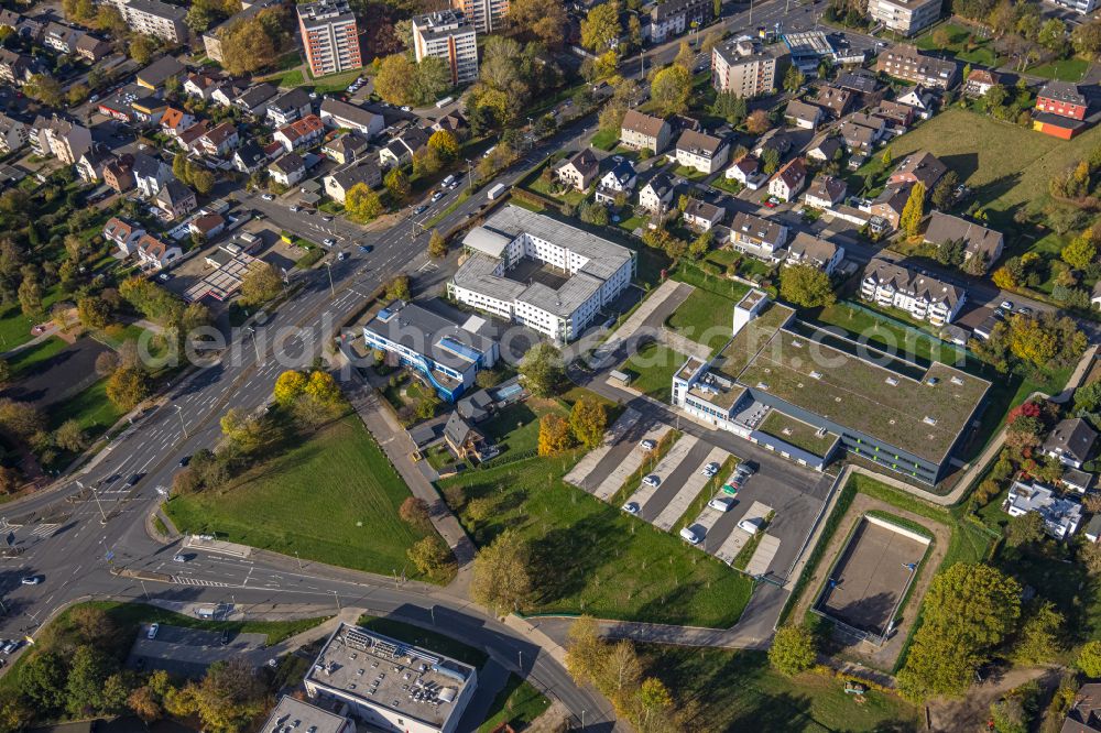 Aerial photograph Hagen - Autumnal discolored vegetation view company grounds and facilities of Sanitaetshaus Riepe GmbH & Co. KG on Knippschildstrasse in Hagen at Ruhrgebiet in the state North Rhine-Westphalia, Germany